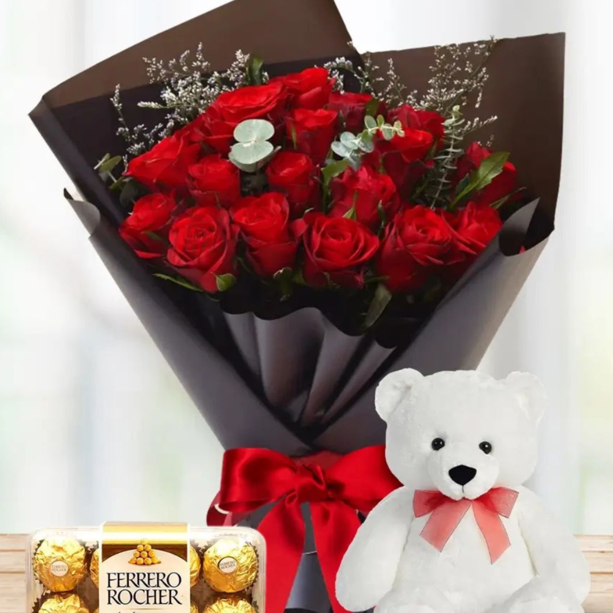 Romance Trio Delight – red roses, teddy bear, and Ferrero Rocher chocolates – Petal Frost Dubai