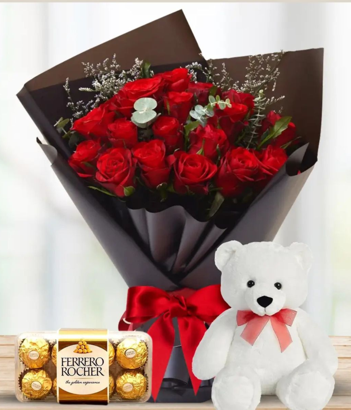 Romance Trio Delight – red roses, teddy bear, and Ferrero Rocher chocolates – Petal Frost Dubai