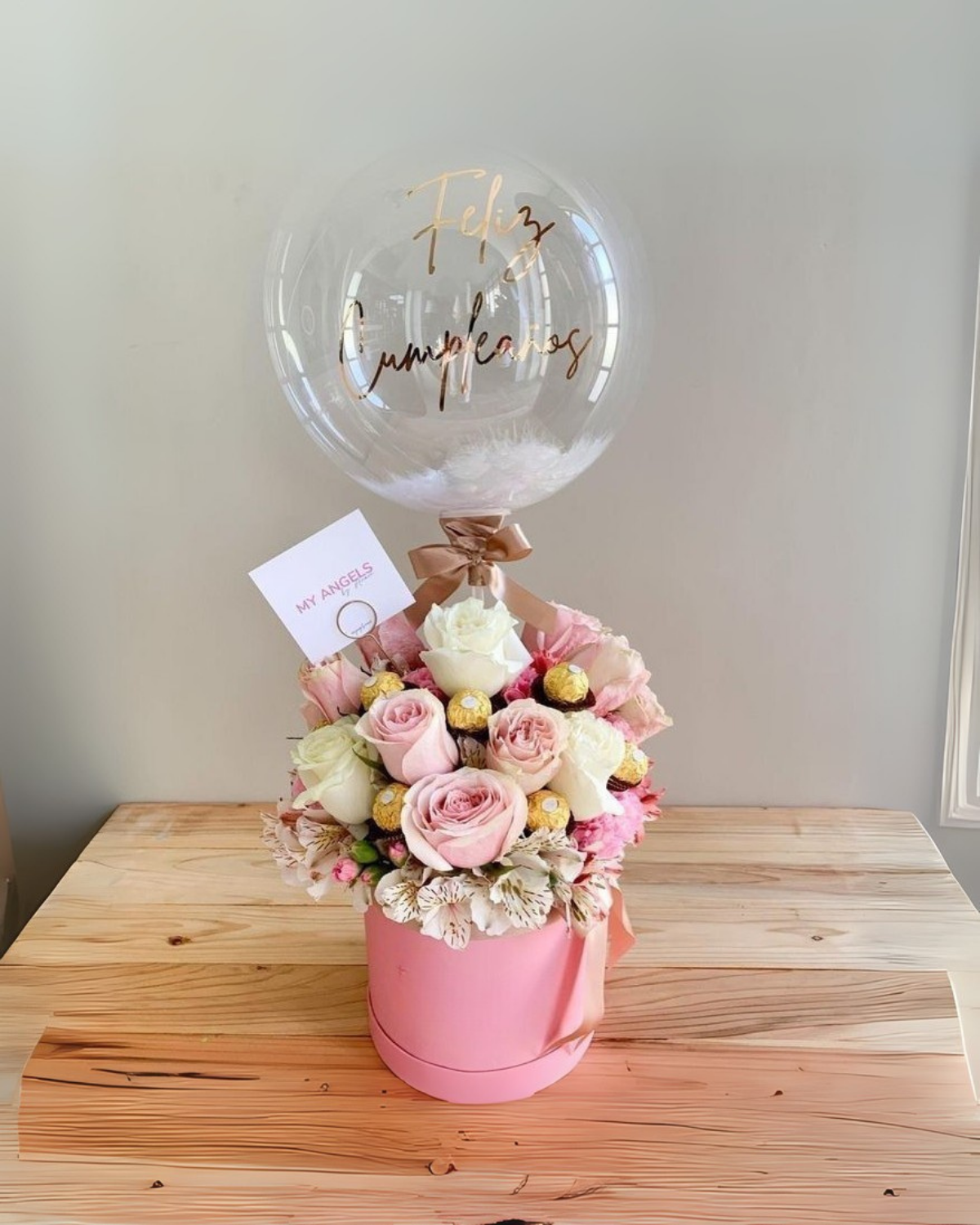 Box with flowers , chocolate ballons
