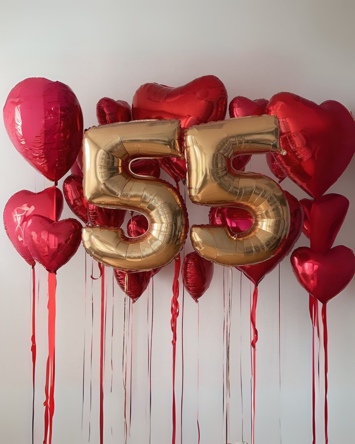 55 golden ballons
