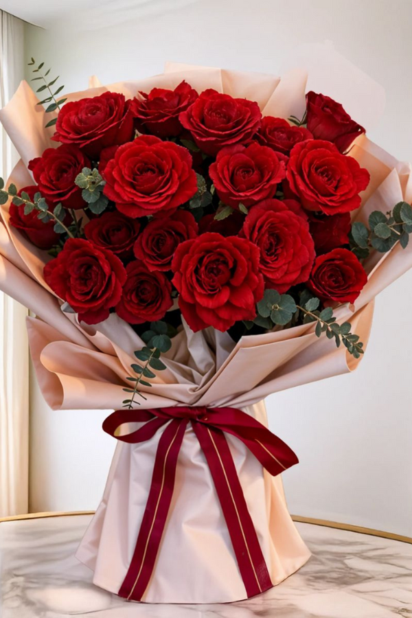 Amour in Blooms bouquet – 20 red roses with fillers – Petal Frost