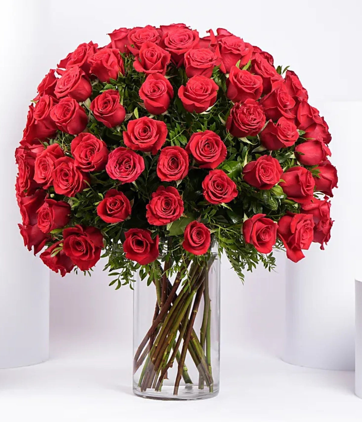 Ravishing 100 Red Roses In Glass Vase