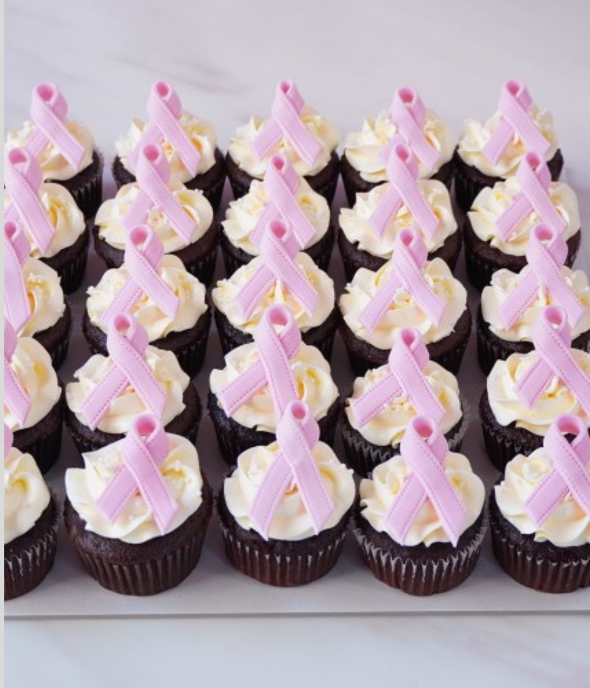 Breast cancer pink ribbon chocolate cupcakes