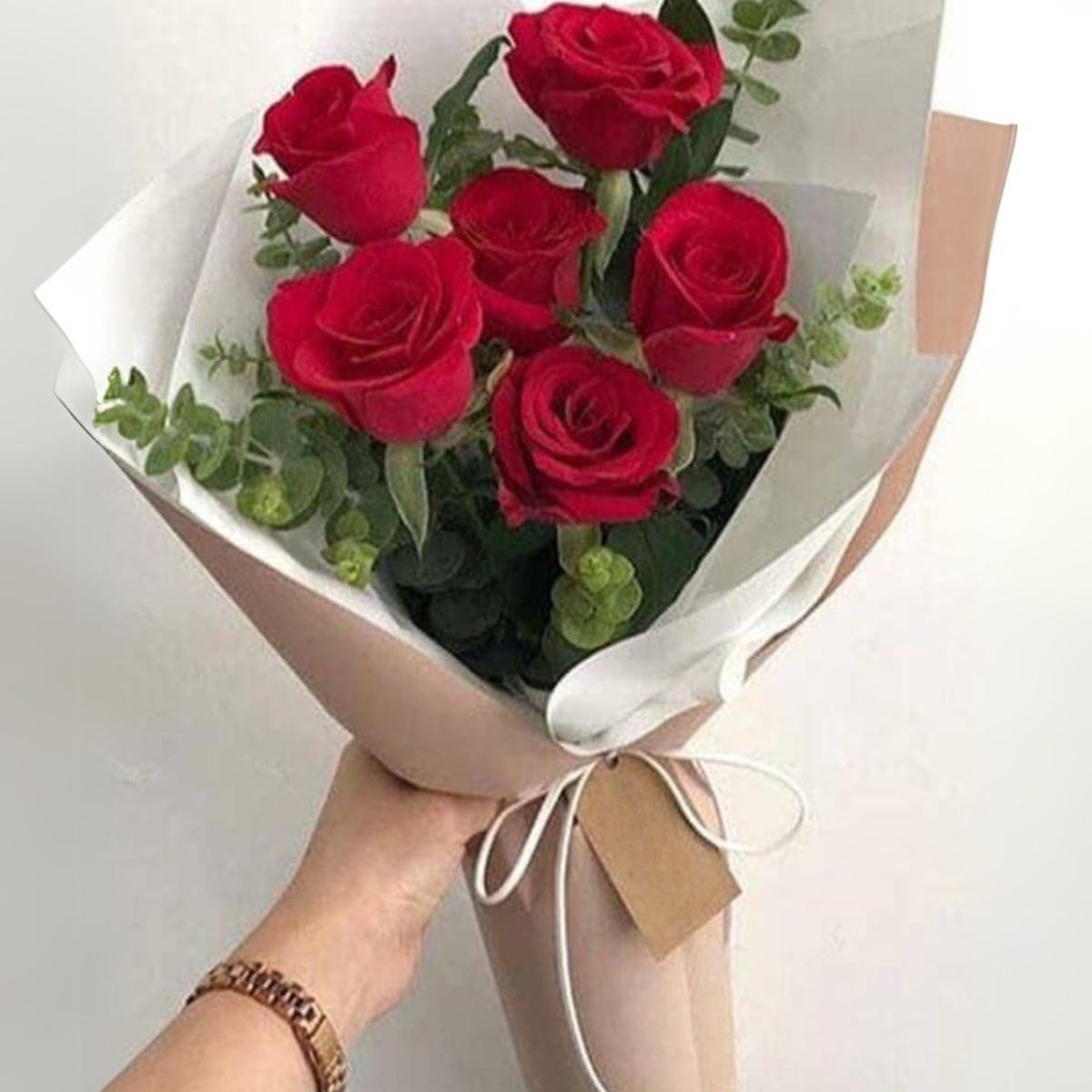 Valentine Radiance Blooms bouquet – 6 red roses with eucalyptus – Petal Frost Dubai