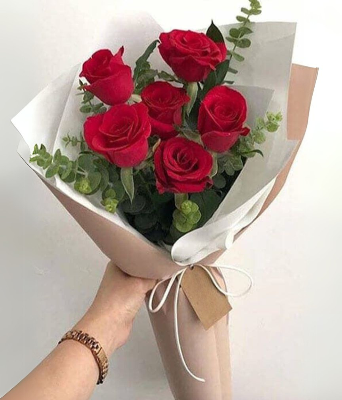 Valentine Radiance Blooms bouquet – 6 red roses with eucalyptus – Petal Frost Dubai