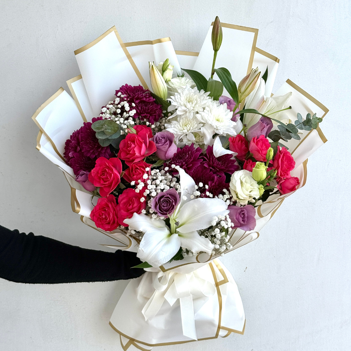 Lily’s Enchanted bouquet – lilies and roses – Petal Frost Dubai