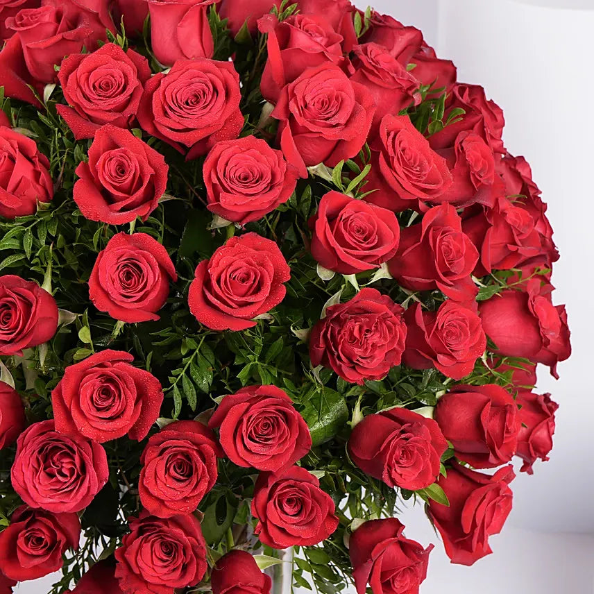 Ravishing 100 Red Roses In Glass Vase